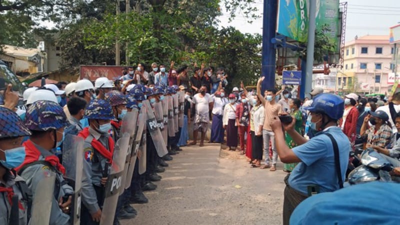 myanmar-police-block-protesters-magway-feb19-2021.jpg