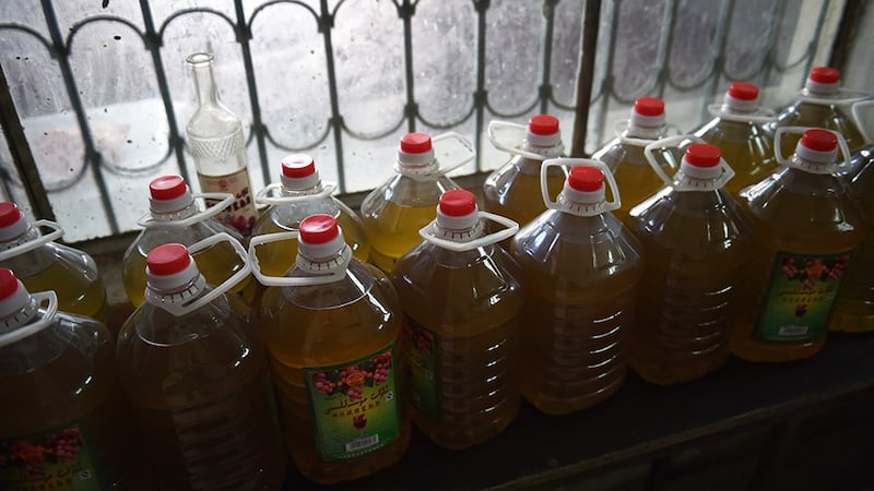 Bottles of wine line a shelf at the Awat Ruby Museles Winery in Awat, Xinjiang, in a file photo. AFP