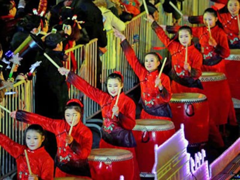 Chinese performers play drum music during a countdown event celebrating the new year at Yongdingmen Gate in China's capital Beijing, Dec. 31, 2017.