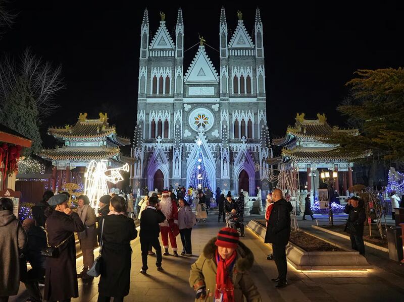 People attend mass at Beijing's Xishiku Catholic Church, Dec. 24, 2024. (Josh Arslan