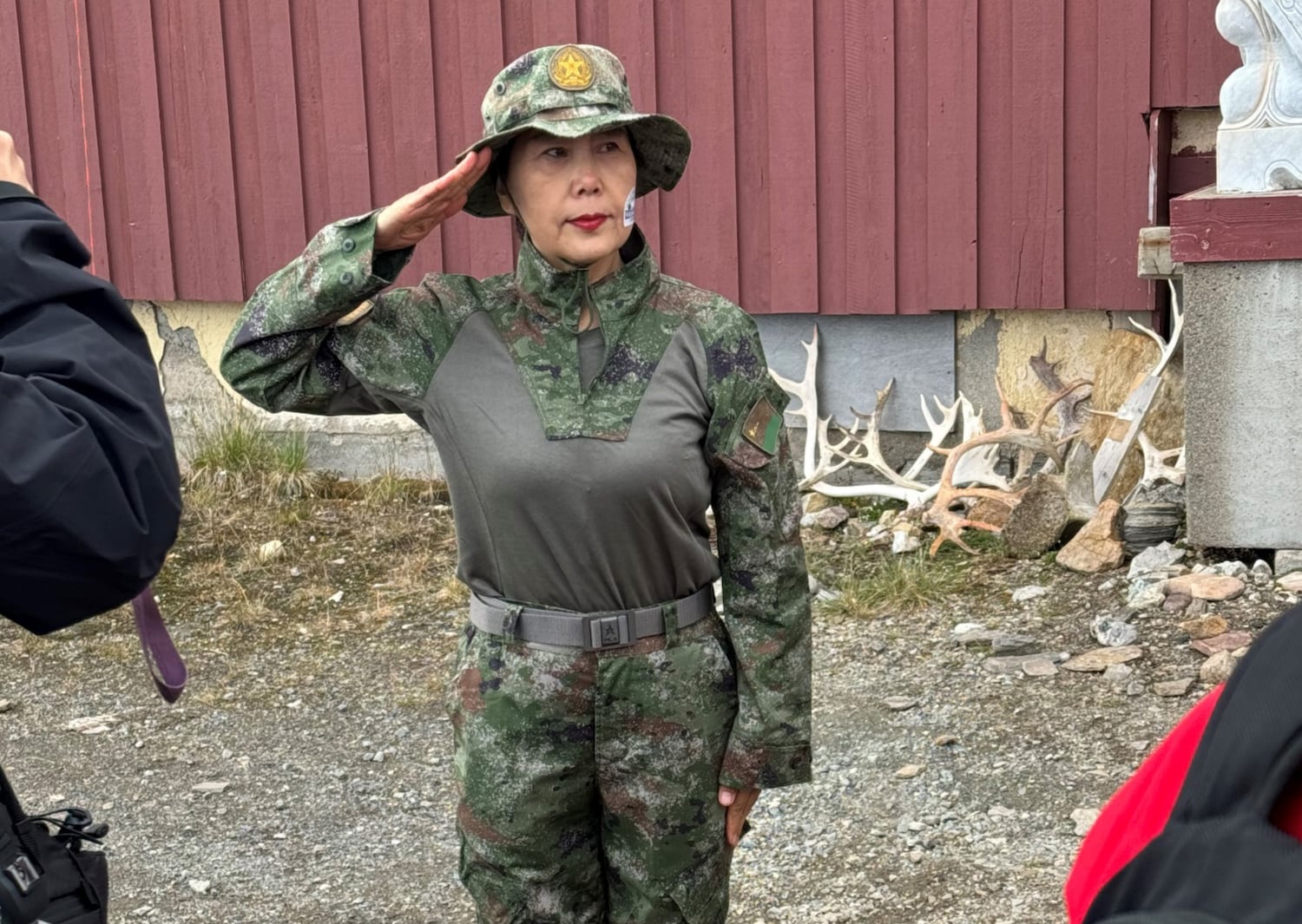 This photo from an internal Norwegian government document seen by RFA and NRK shows a woman in a People’s Liberation Army uniform saluting during ceremonies to mark the 20th anniversary of China’s Yellow River Research Station in Svalbard, Norway.