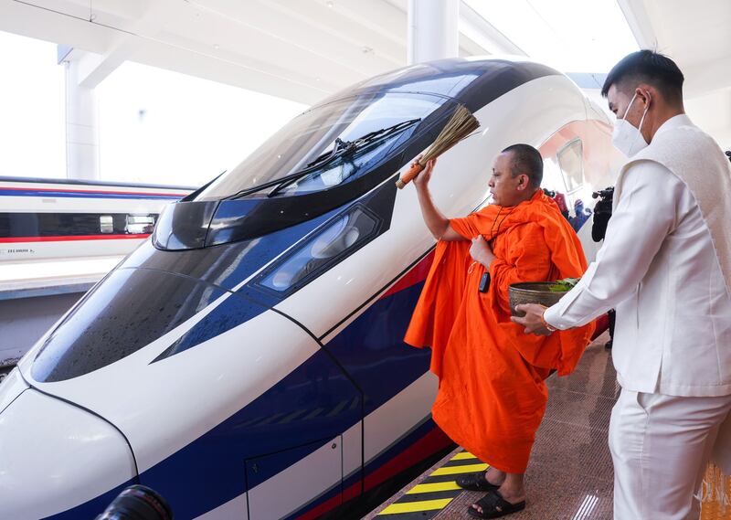 2021-12-02T054500Z_669434886_RC206R9QE41F_RTRMADP_3_LAOS-CHINA-TRAIN.JPG