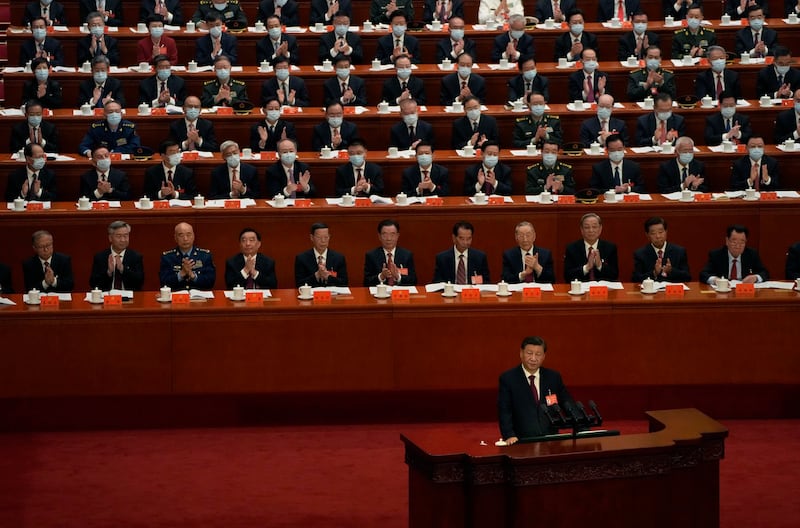 In this Oct. 16, 2022, photo, delegates applaud as Chinese President Xi Jinping speaks during the opening ceremony of the 20th National Congress of China's ruling Communist Party held at the Great Hall of the People in Beijing, China. Credit: AP