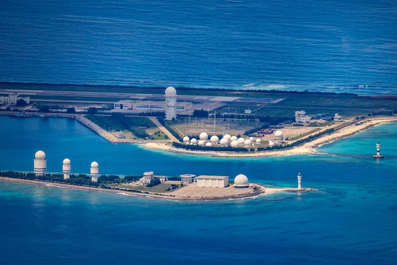 In this Oct. 25, 2022 aerial photo, buildings, airstrips and communication structures are seen on the artificial island built by China in Mischief Reef in Spratly Islands, South China Sea. (Photo: Ezra Acayan/Getty Images)