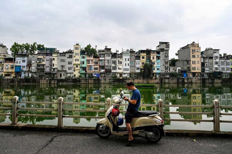 Hanoi's tube houses, so named because of their tube-like shape, dominate the city's streets as 9 million people compete for space in the bustling capital. (AFP)