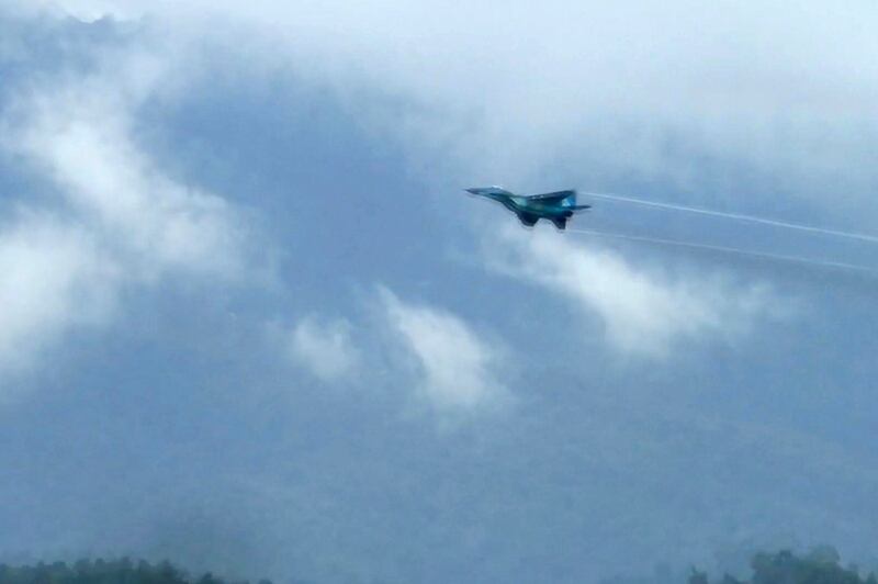 In this image taken from video, a Myanmar air force fighter jet is visible from Tak province, Thailand, June 30, 2022. Credit: Associated Press