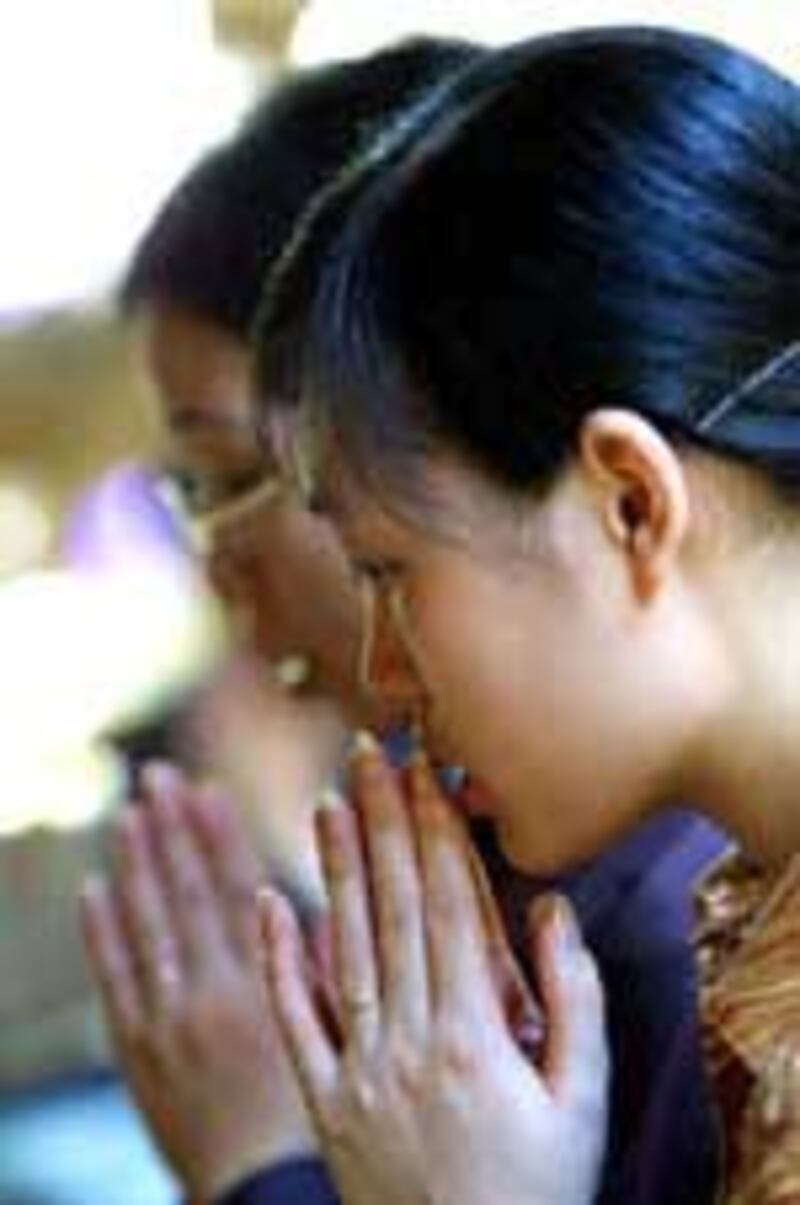 BuddhistPraying150.jpg