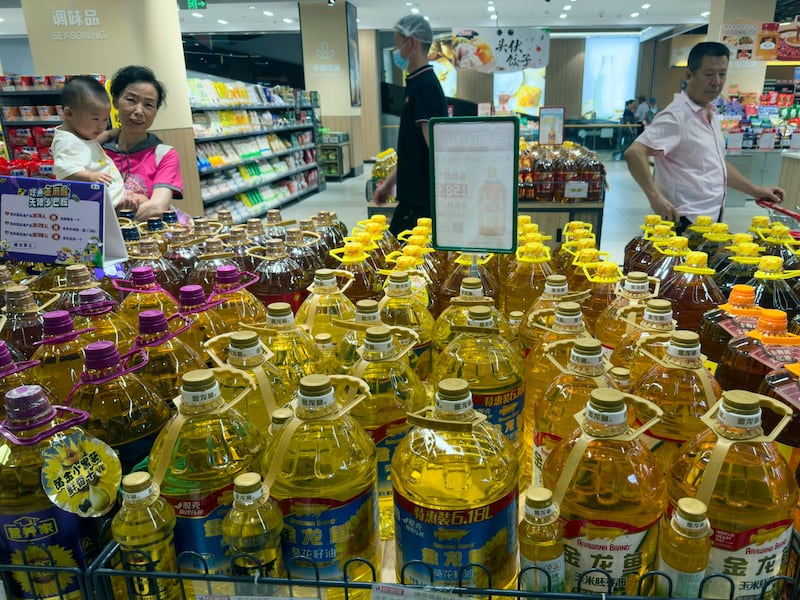 Cooking oil products are seen at a supermarket in Beijing, July 10, 2024.