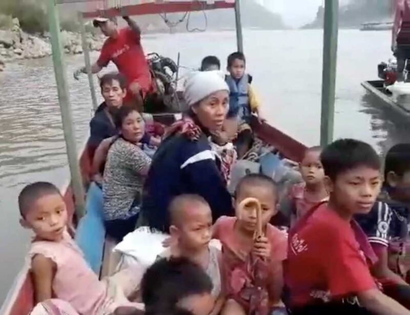 Karen refugees cross the Salween River to Mae Hong Son, Thailand. (Reuters)