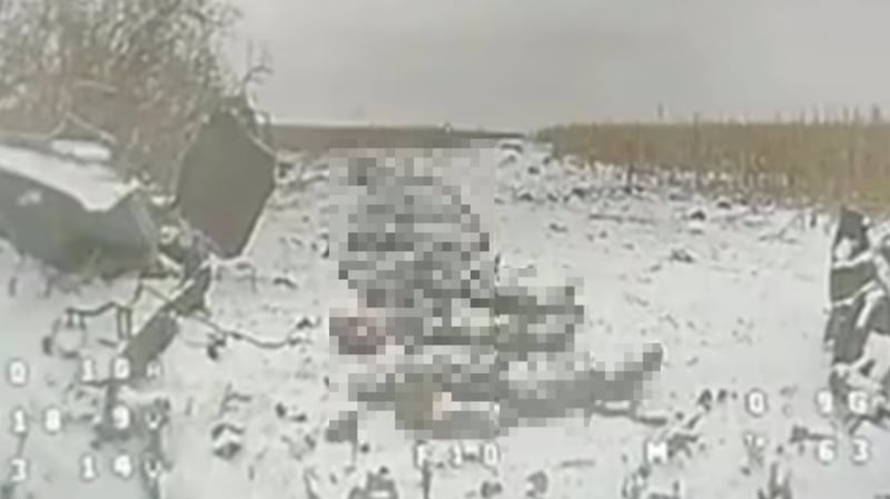 An image made from video released by the Ukrainian drone warfare unit Magyar’s Birds. The unit said it shows the bodies of North Korean soldiers killed in the Kursk region. Part of the image has been blurred by RFA.