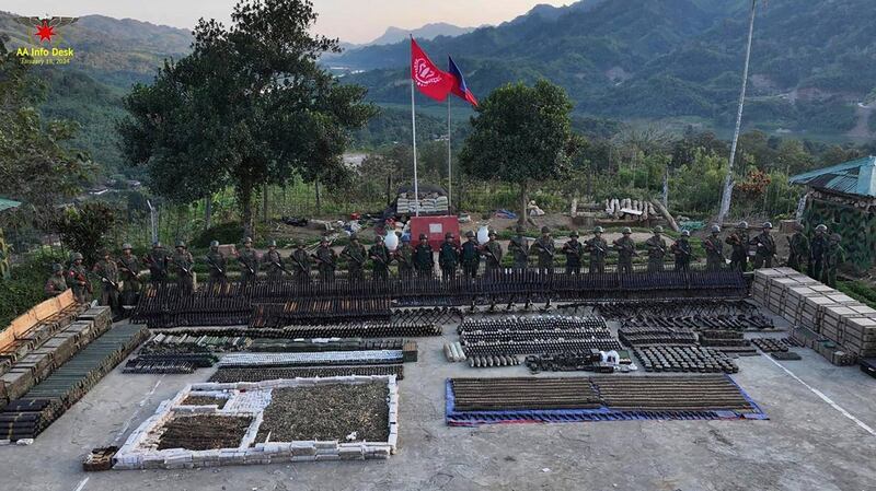 Arakan Army fighters pose with confiscated arms, ammunition and military devices after taking control of Light Battalion 289 and Military Operations Command 19 of Myanmar junta in Paletwa, Rakhine state, Jan. 18, 2024. (AA Info Desk)