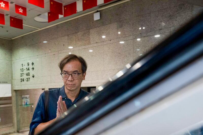 Chung Pui-kuen, the ex-chief editor of the now shuttered Stand News online outlet, outside the district court, in Hong Kong, Aug. 29, 2024. (Billy H.C. Kwok/AP)