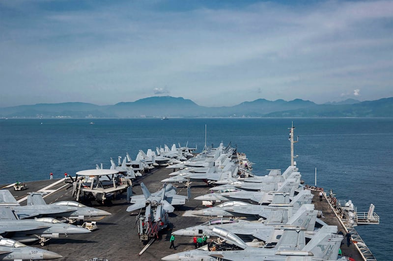 USS Ronald Reagan (CVN 76) approaches Da Nang, Vietnam, for a port visit on June 25, 2023. (Mass Communication 3rd Class Jordan Brown/U.S. Navy via AP)