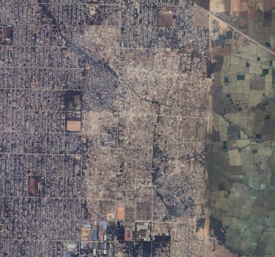 The location of a razed neighborhood (light brown in center of image) in Myanmar's Mandalay region is seen on April 16, 2023. Credit: Airbus