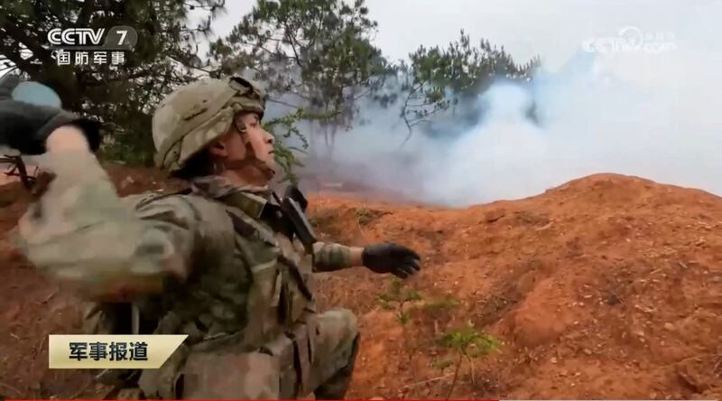 A Chinese soldier takes part in an exercise during a CCTV report on this month's Laos-China military drills. Credit: Screenshot from CCTV video