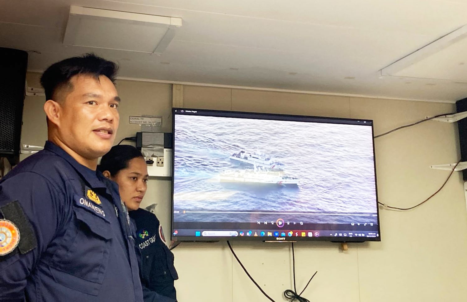 Lt. Cmdr. Lee Omaweng, commanding officer of the Philippine coast guard vessel BRP Sindangan, which serves at both Scarborough and Second Thomas Shoal, speaks to reporters on board his ship, Dec. 8, 2024.