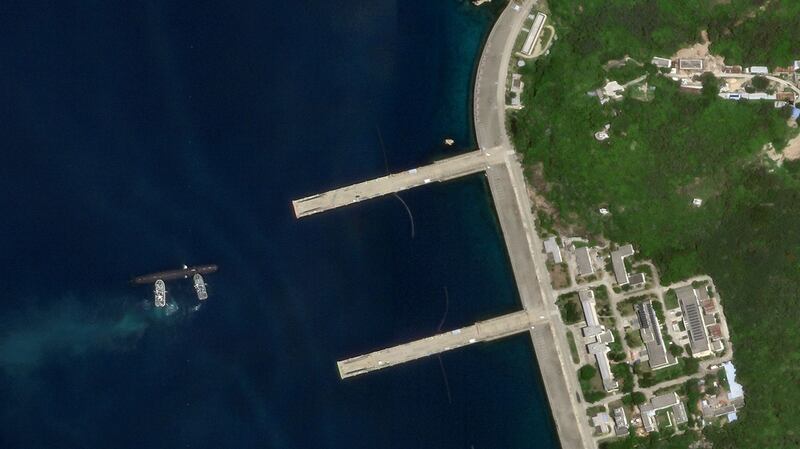 An image from Aug. 19 shows the Type 093 sub getting pushed towards one of Yulin's piers. China has built-up its submarine force in recent years and greatly outclasses other claimants in the South China Sea, but still remains at a disadvantage to the United States. 