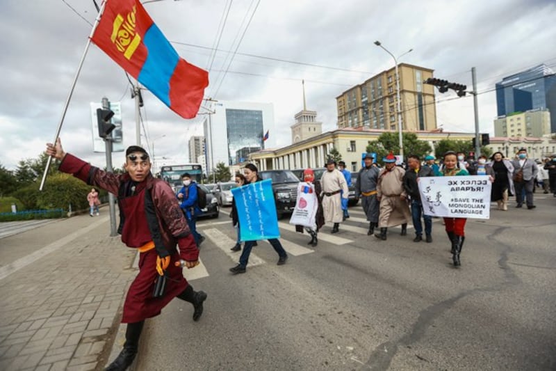 Mongolians protest China's plan to introduce Mandarin-only classes at schools in the Chinese province of Inner Mongolia, at Sukhbaatar Square in Ulaanbaatar, capital of Mongolia, on Sept. 15, 2020. Credit: Byambasuren Byamba-Ochir/AFP