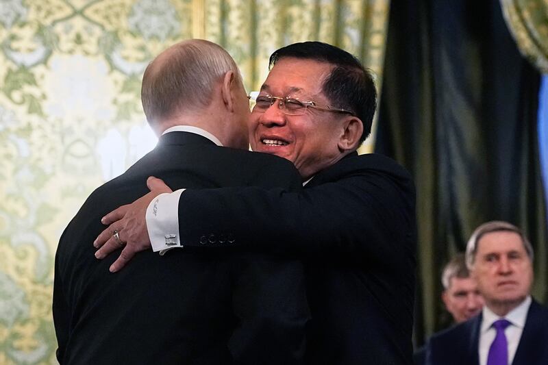 Russian President Vladimir Putin and Myanmar's military chief Min Aung Hlaing hug at the Grand Kremlin Palace in Moscow, March 4, 2025.