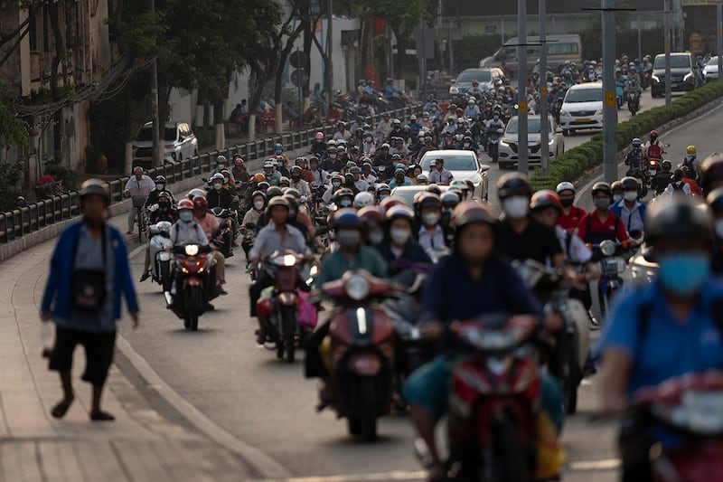 Commuters fill the street during morning rush hour in Ho Chi Minh City, Jan. 12, 2024. (Jae C. Hong/AP)