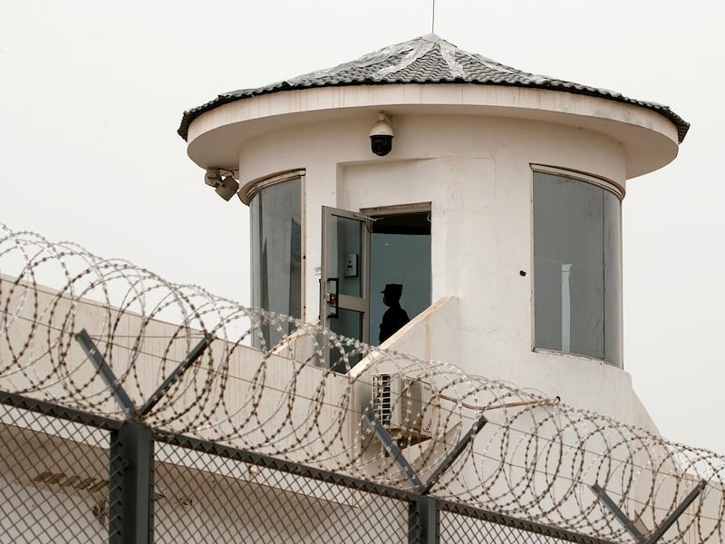 A guard stands in a watchtower of Kashgar prison in Kashgar, Xinjiang, Uyghur Autonomous Region, China, May 3, 2021.