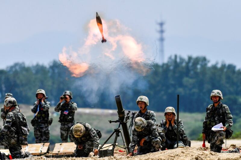 Soldiers of the Chinese People's Liberation Army fire a mortar during a live-fire military exercise in Anhui province, China in 2021. Credit: CNS photo via Reuters