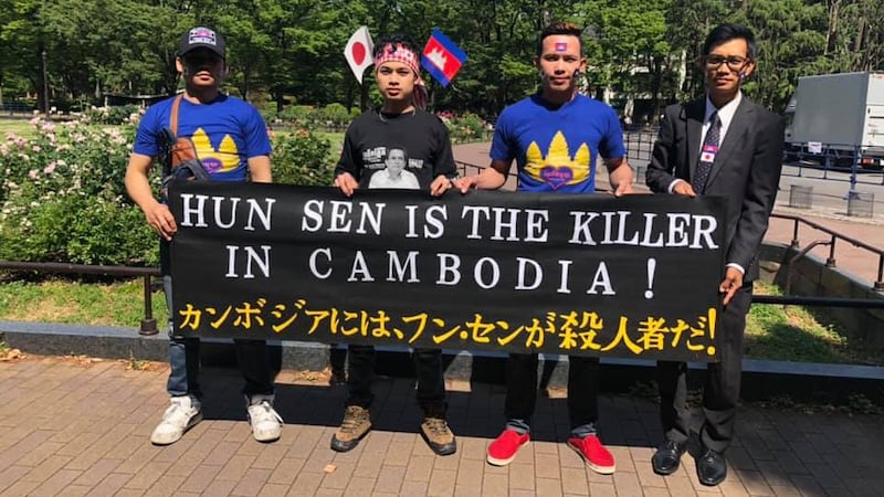 Members of the Cambodian diaspora in Japan display a banner used in a protest against Hun Sen in Tokyo, May 30, 2019. Credit: RFA listeners