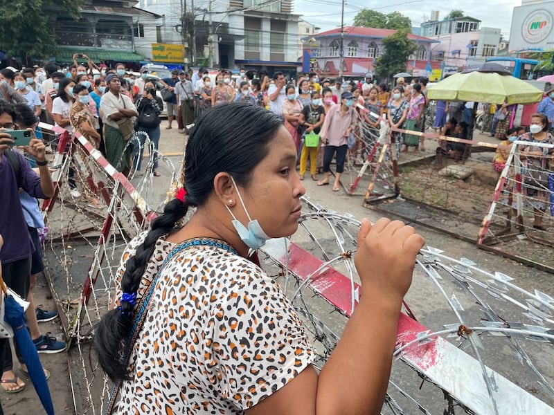 A woman waits for detainees to be released from Insein Prison in Yangon, Oct. 18, 2021. RFA