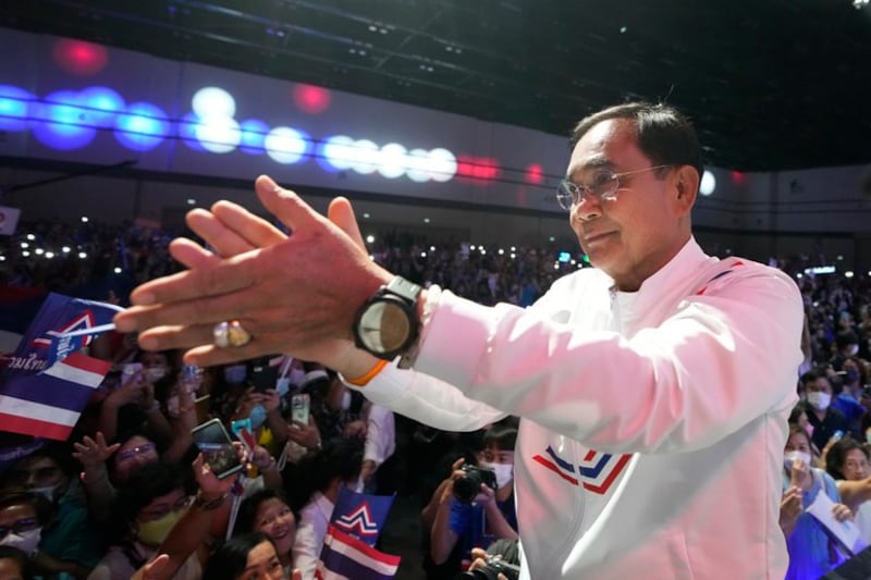 Thai Prime Minister Prayuth Chan-o-cha gestures to supporters during a final general election campaign rally in Bangkok, May 12, 2023. Credit: Sakchai Lalit/AP Photo