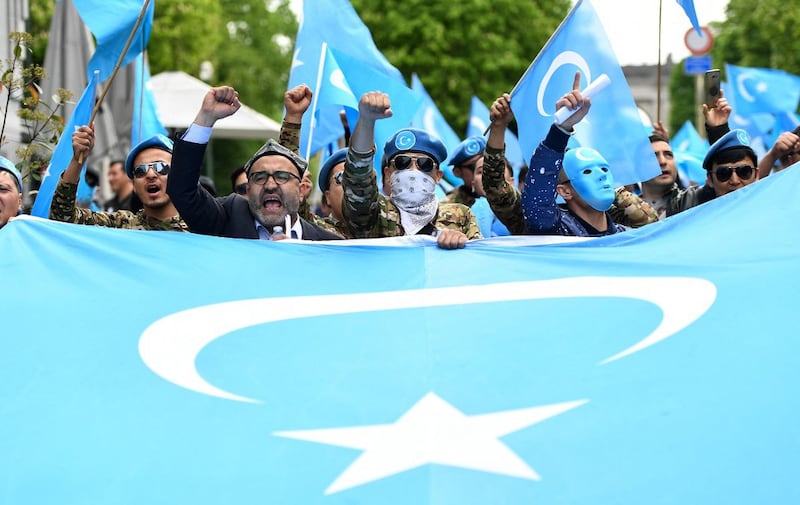 Uyghurs protest to urge the European Union to call upon China  to close  "re-education centers" in Xinjiang,  Brussels,  April 27, 2018.