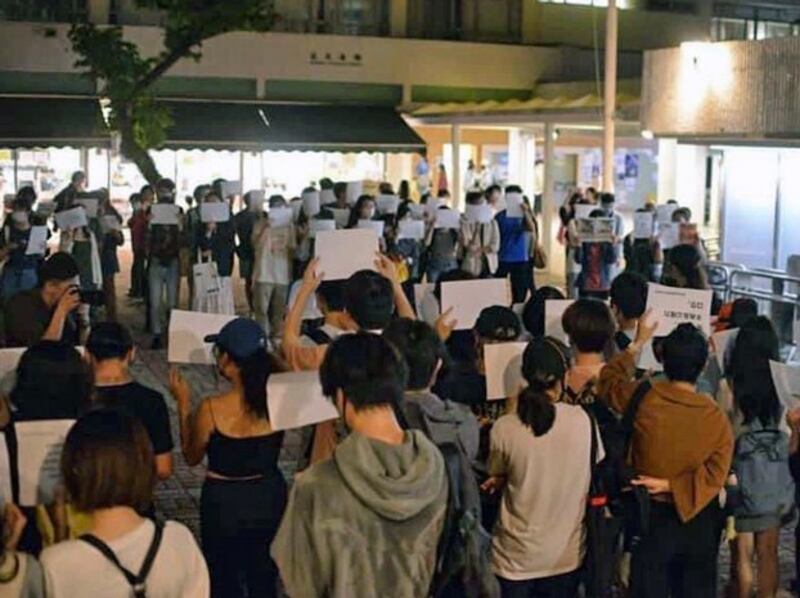 Students at the Chinese University of Hong Kong take part in a white paper protest in 2022. Credit: Provided by Zeng Yuxuan