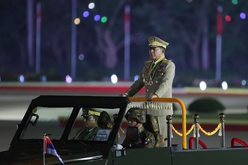 Myanmar junta chief Senior Gen. Min Aung Hlaing inspects soldiers during a parade to commemorate Myanmar's 79th Armed Forces Day, in Naypyidaw, March 27, 2024. (Aung Shine Oo/AP)