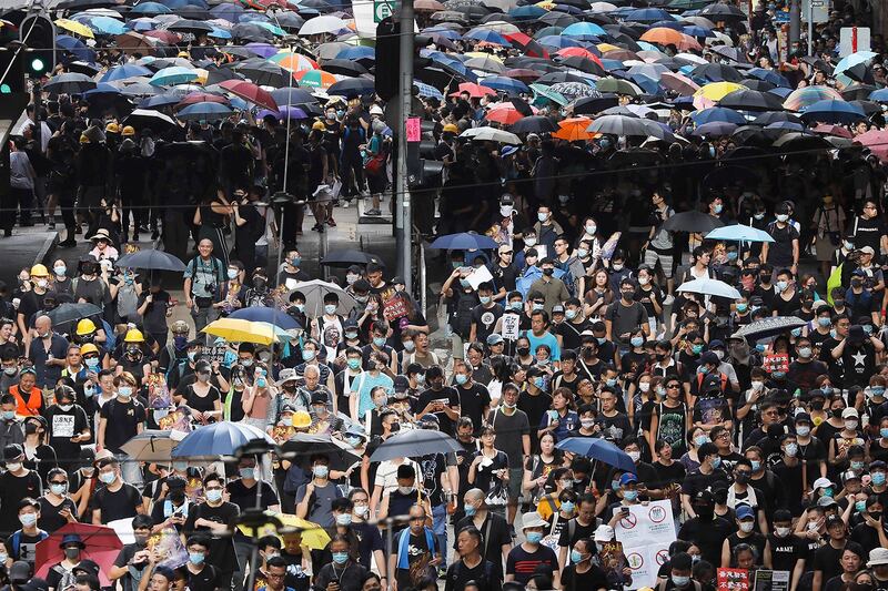 2019年7月28日,上万民众在香港中心集会游行。（美联社）