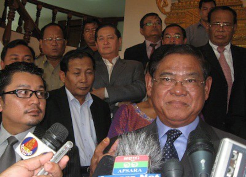 Sar Kheng speaks to reporters after a meeting with NGOs in Phnom Penh, Aug. 9, 2013. Photo credit: RFA.