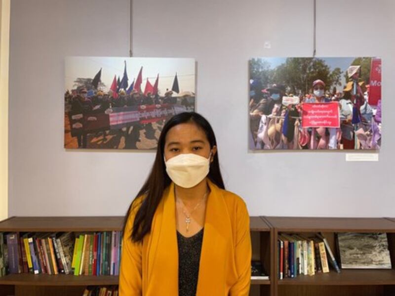 Burmese activist Pan Hsu Pyae Eain, who fled to Myanmar for Thailand after last year's coup, attends an exhibition on the Myanmar protests, in Bangkok, Feb. 1, 2022. Credit: BenarNews