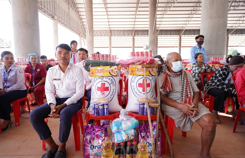 Villagers from Siem Reap province receive gifts from the Cambodian Red Cross, Dec. 25, 2024.