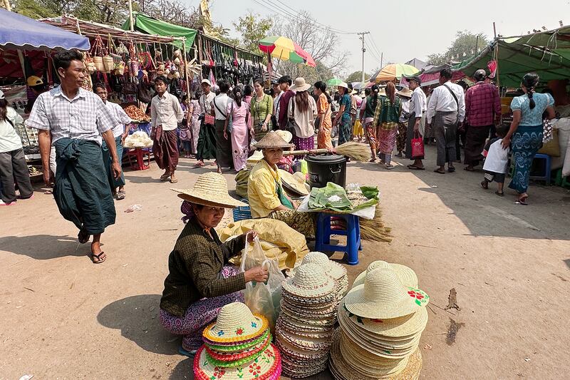 Vendors at the annual Shwe Saryan Pagoda harvest festival in Shwe Saryan village, Patheingyi township, Mandalay region, Myanmar, March 11, 2025.