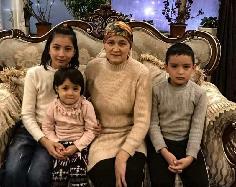 Shehide, 13, Nehdiye, 5, their mother Qemernisa Abdurahman, 48, and Abdurahman, 9, are seen in an undated photo. All four – as well as another child of Abdurahman – died in the residential building fire in Xinjiang's capital Urumqi on Nov. 24, 2022. Credit: Handout