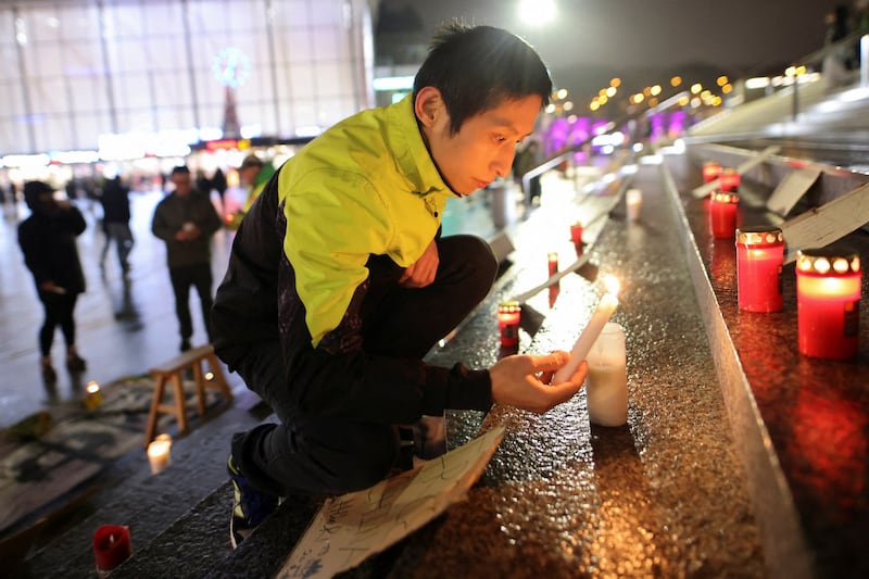 2022-11-30T000000Z_1065231080_RC2IWX9FE2L1_RTRMADP_3_HEALTH-CORONAVIRUS-CHINA-GERMANY-PROTEST.JPG