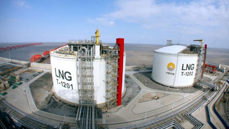 Containers hold liquefied natural gas at Yangkou Port in Nantong, east China's Jiangsu province, Jan. 4, 2014.