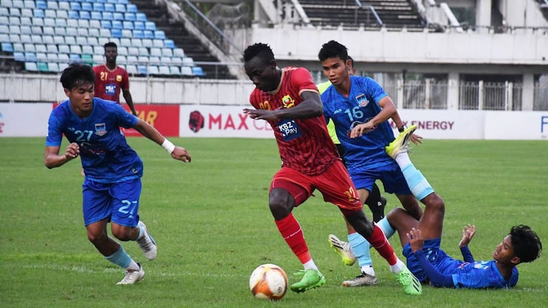 Shan United FC's Bello, a top scorer in the Myanmar National League, maneuvers during a match. (Shan United FC)