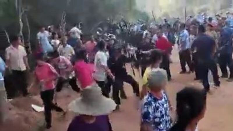 A screen grab from a video shows Feilaixia villagers clashing with police on May 8, 2017.