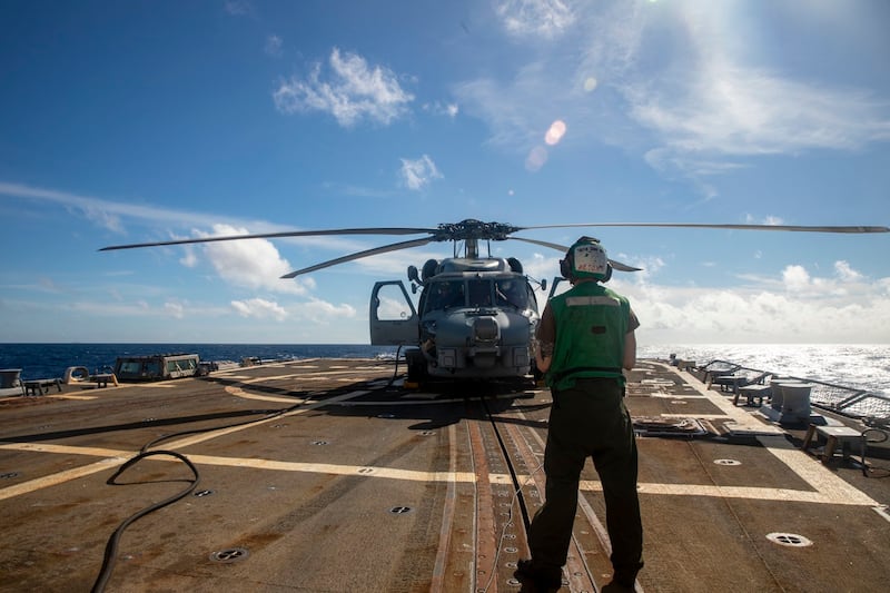 A MH-60R helicopter during flight operations aboard guided-missile destroyer USS Ralph Johnson on Feb.14, 2022. Credit: U.S. Navy