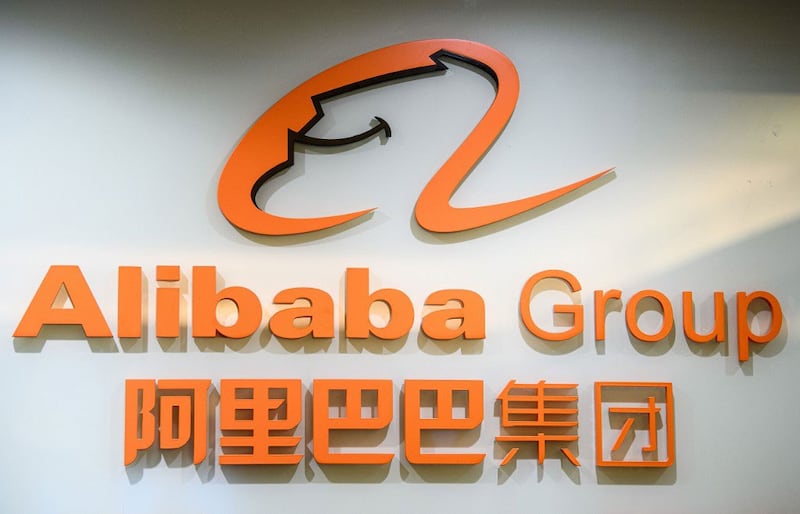 This file photo taken on October 30, 2020, shows the logo of the Alibaba Group outside the offices of the Ant Group, the financial arm of the Chinese e-commerce giant, in Hong Kong.