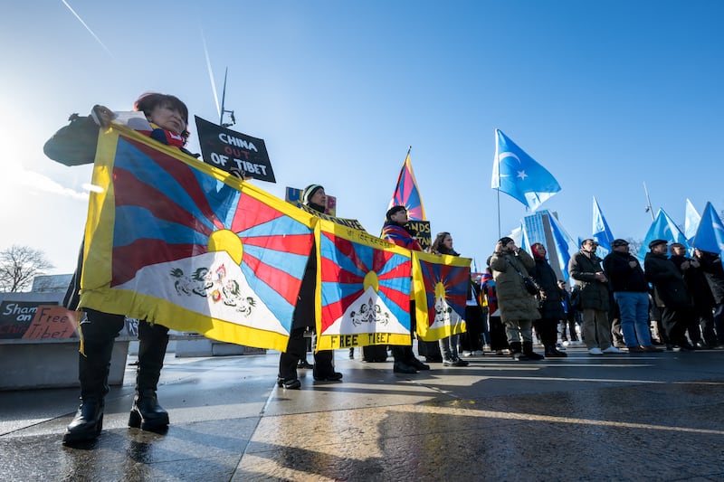 Tibetan and Uyghur activists protest outside of the UN offices in Geneva during the review of China's rights record by the United Nations Human Rights Council, Jan. 23, 2024. China faced criticism from Western countries during a review of its rights record at the United Nations but it was also lauded by many countries including India and Eritrea. Beijing was facing a regular Universal Periodic Review (UPR) — an examination all 193 UN member states must undergo every four to five years to assess their human rights record.