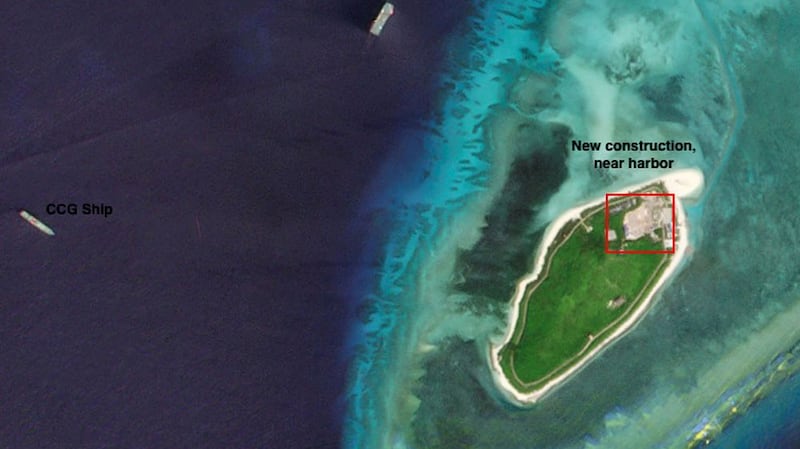 Drummond Island, as seen on Oct. 3, has had a swathe of land cleared and paved next to its port. A CCG ship is seen in the waters to the islet's west. 