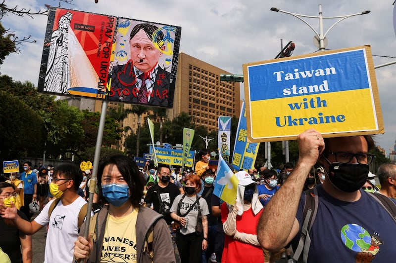 People attend a rally against Russia's invasion of Ukraine in Taipei, Taiwan, March 13, 2022. Credit: Reuters