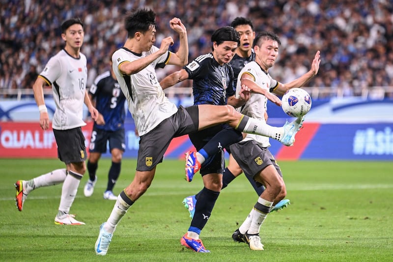 02-China-Japan-Soccer-World-Cup_Football.jpg