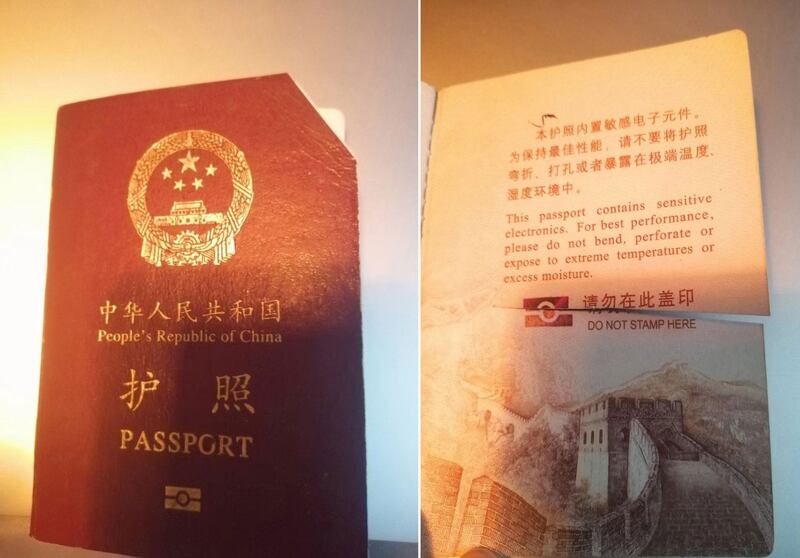 The corner on Guo Zhenming's passport was clipped and the back cut by police. Credit: Provided by Guo Zhenming