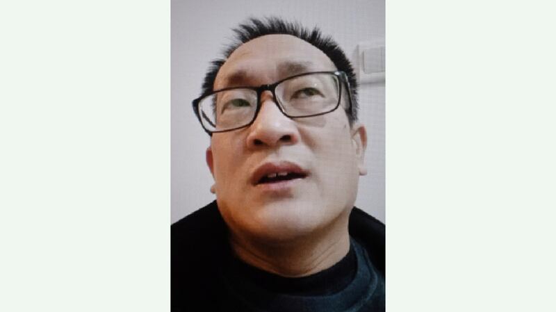 Chinese human rights lawyer Wang Quanzhang speaks via video link from his home in Jinan, in China's eastern Shandong province, April 23, 2020. Credit: AFP